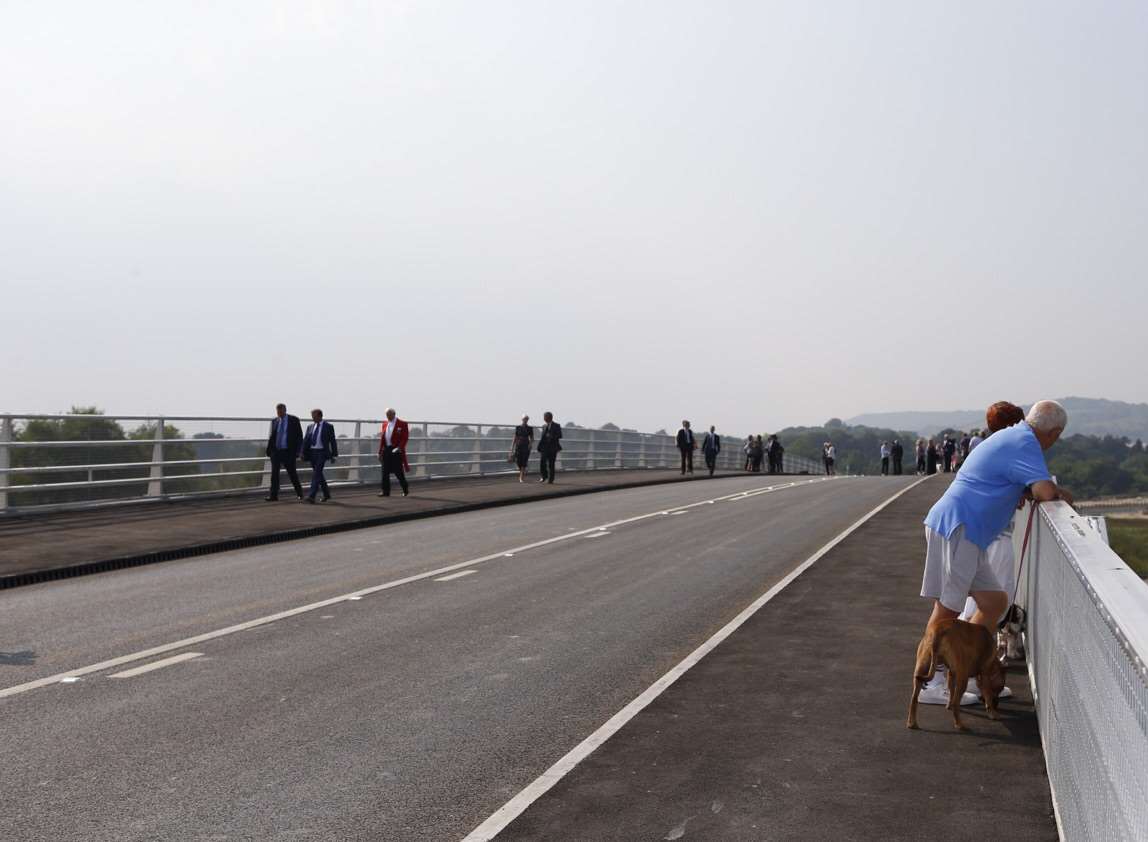 Residents take in the views from the new bridge