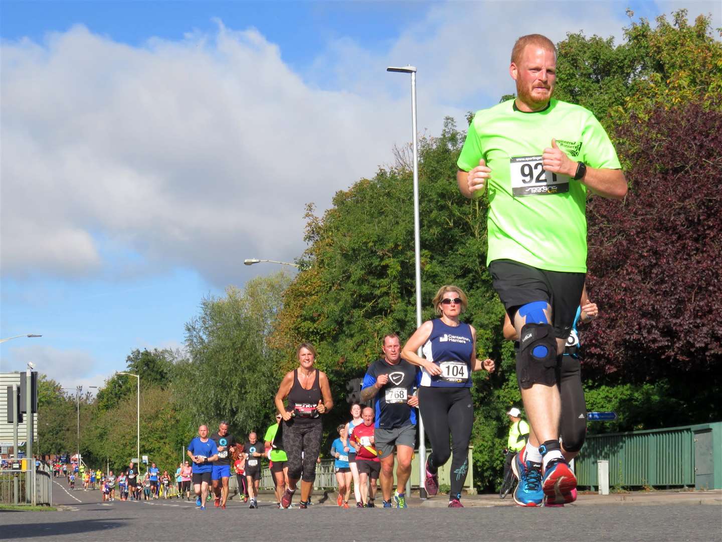Paul Spencer is pictured during last year's Givaudan 10k race, as runners approach the Mace Lane roundabout in Ashford. Picture: Andy Clark