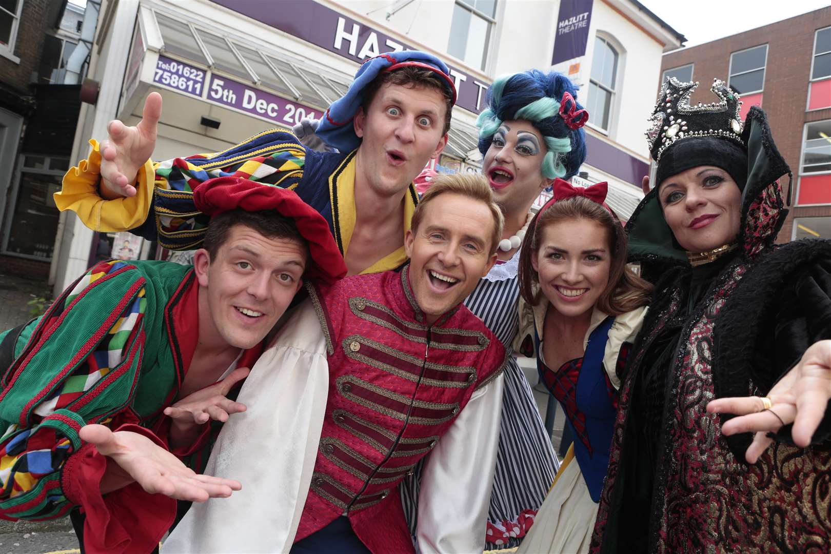 Some of the cast of Snow White and the Seven Dwarfs outside the Hazlitt