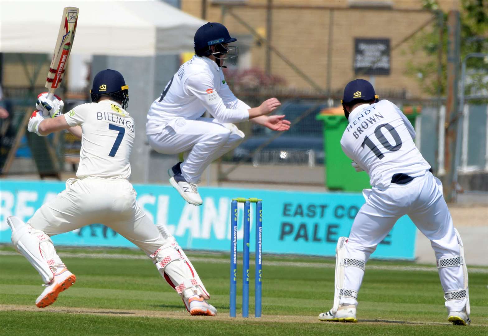 Sam Billings, left, takes the fight to Hampshire as Kent salvaged at Canterbury on Sunday. Picture: Barry Goodwin