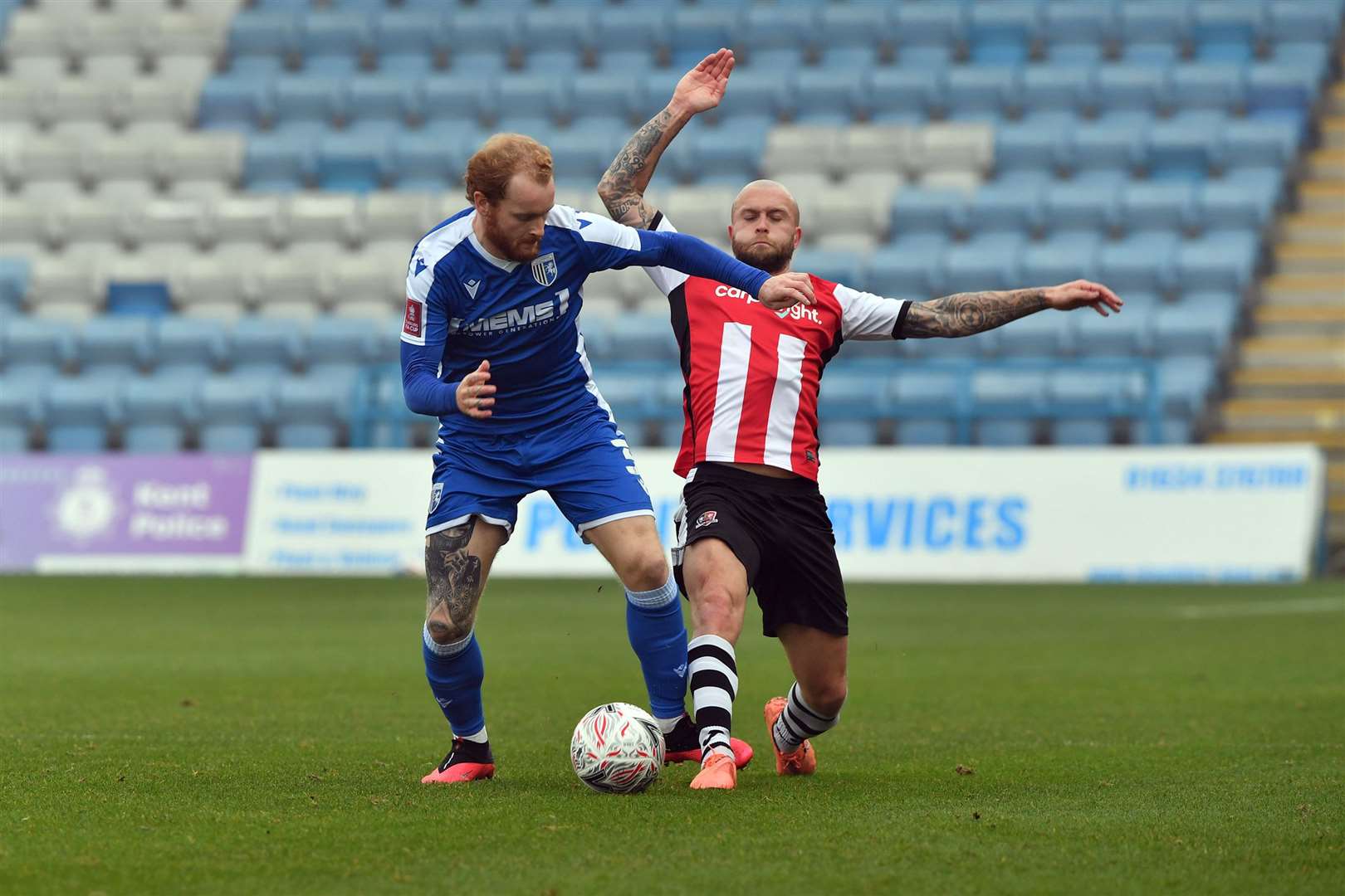 Gillingham's Connor Ogilvie up against Exeter City in the FA Cup Picture: Keith Gillard