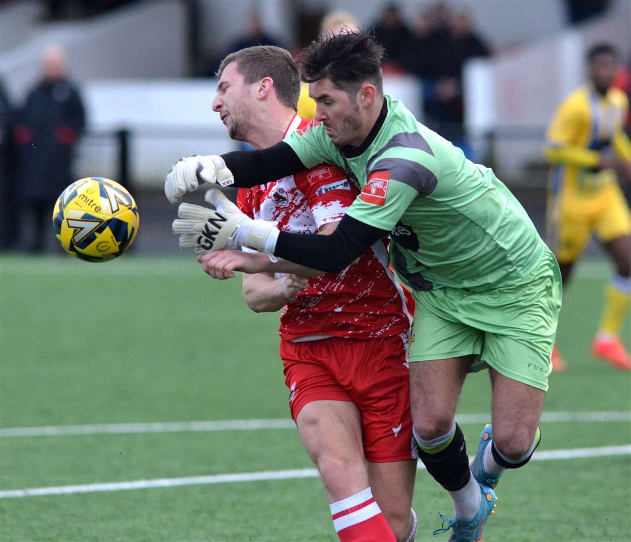 Harley Earle beats Sittingbourne old boy Kane Rowland to the ball. Picture: Randolph File