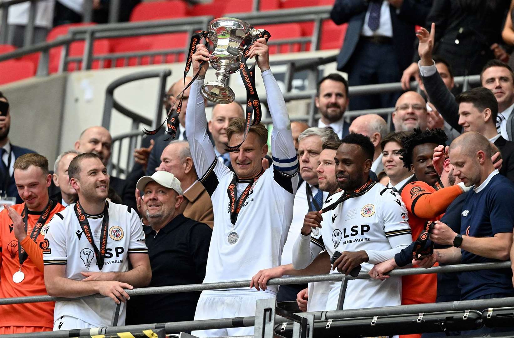Former Bromley midfielder Luke Coulson missed the chance to watch his old team-mates seal promotion to the Football League for the first time in their history at the weekend. But he did speak to Byron Webster, pictured, and Michael Cheek on the day of the game