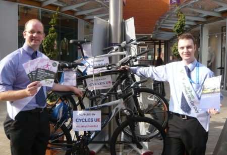 KCC's Graham Tanner and Jack Callaghan with one of the bikes that can be won at the end of the green week. Picture: Mary Graham