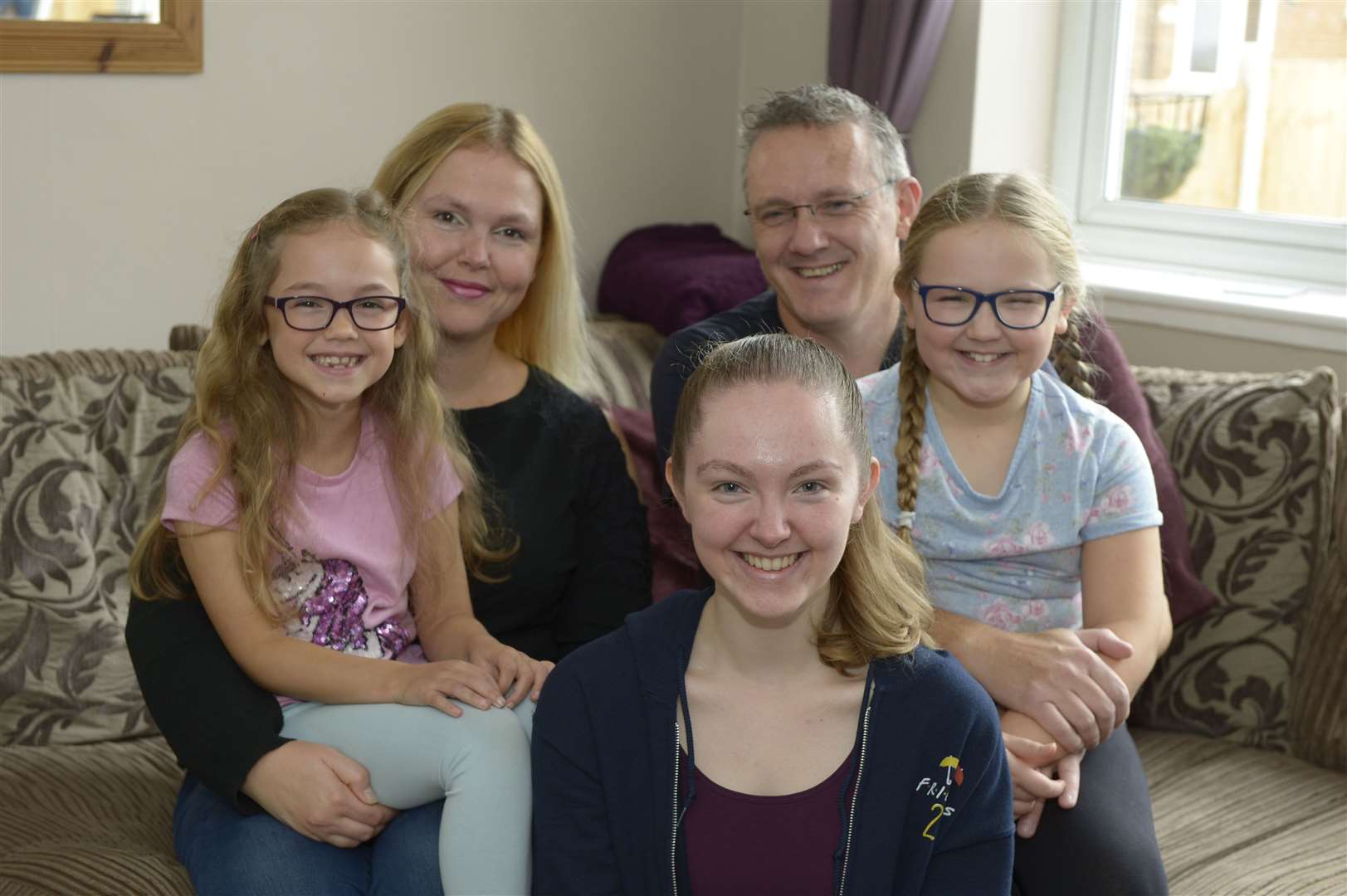 Young Fundraiser Morgan Wright, 16. Pictured here with her mum Kelly, dad Paul and sisters Lottie and Phoebe.