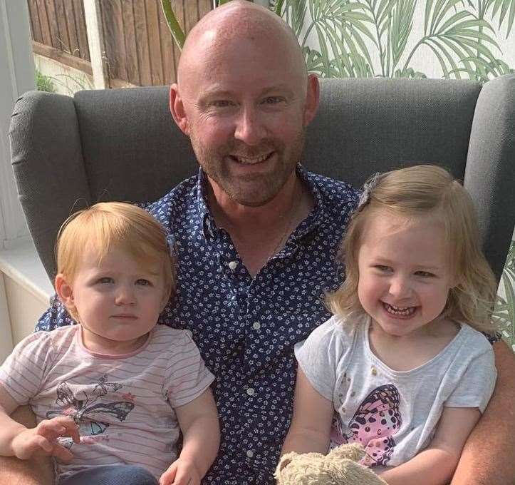 Dad Chris Brooks with daughters Ava, left, aged two, and Faye, who is three