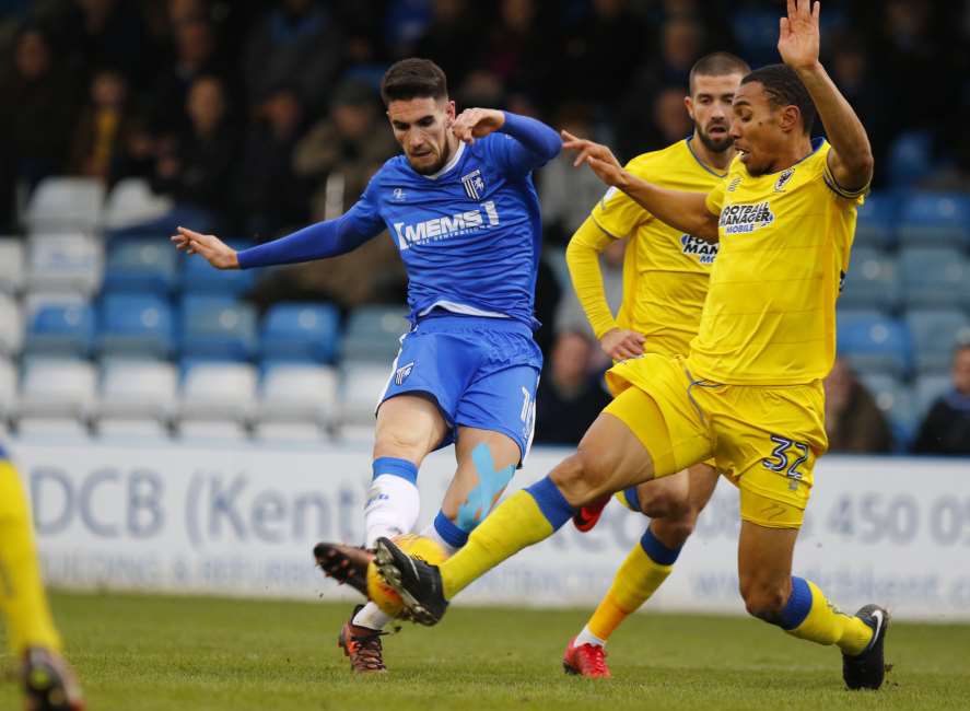 Conor Wilkinson in action against AFC WImbledon Picture: Andy Jones