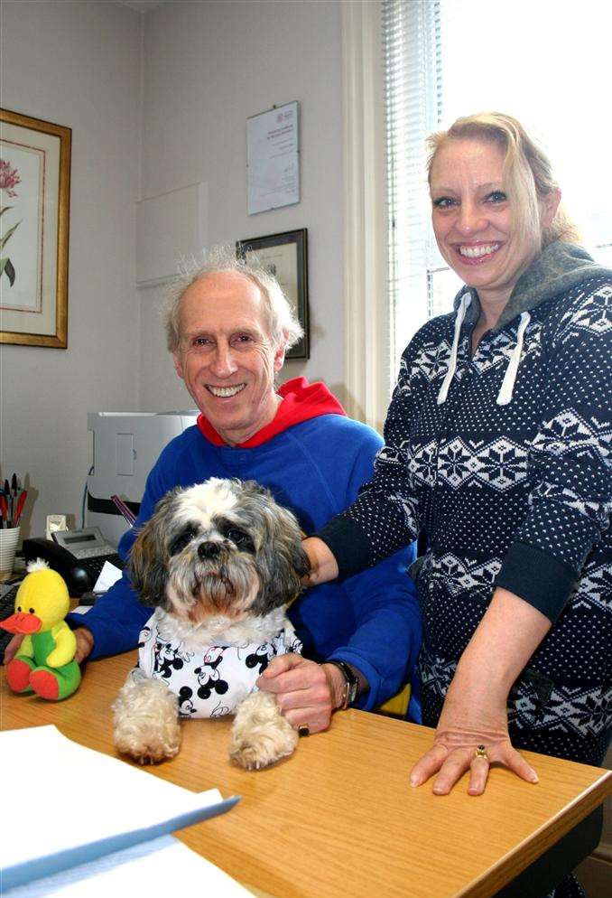 Colin Chapman, senior partner at Barnes Marsland Solicitors in Broadstairs High Street, and practice partner Jane Mackenzie, at work in their alternative attire for a day of fund and awareness raising for charity Narcolepsy UK. assisted by office dog George.