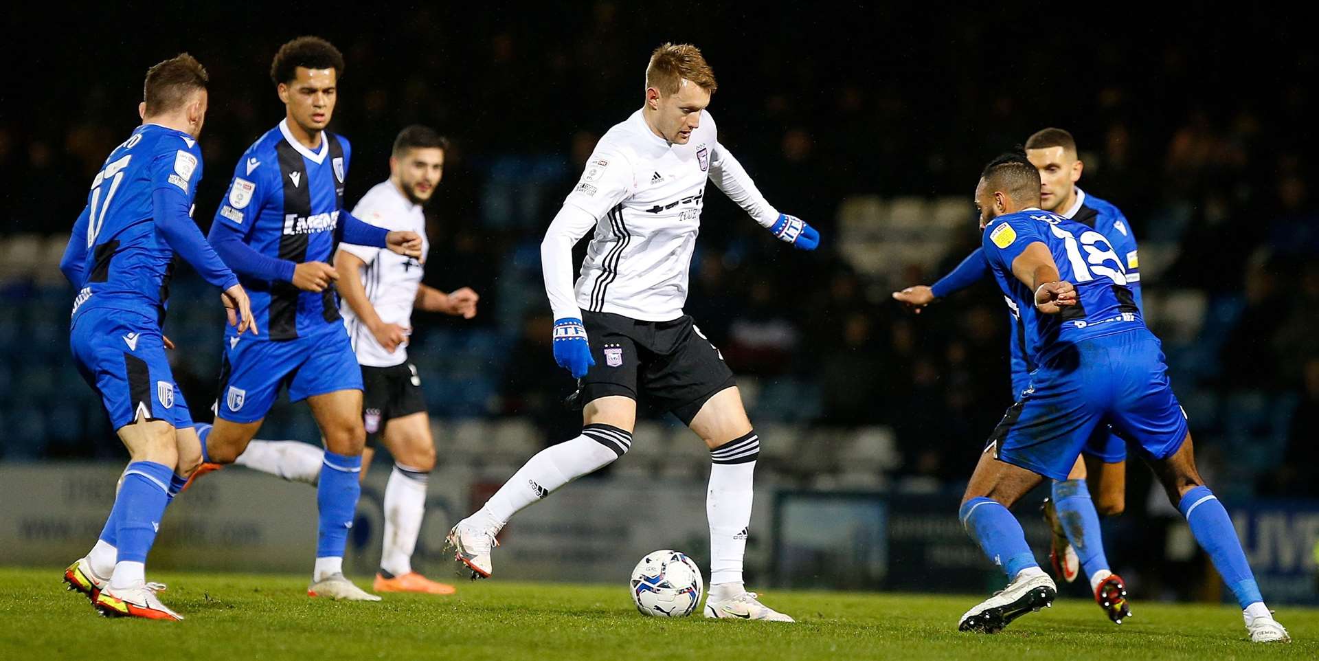 Former Maidstone United forward Joe Pigott is outnumbered as Gills go on the defensive. Picture: Andy Jones