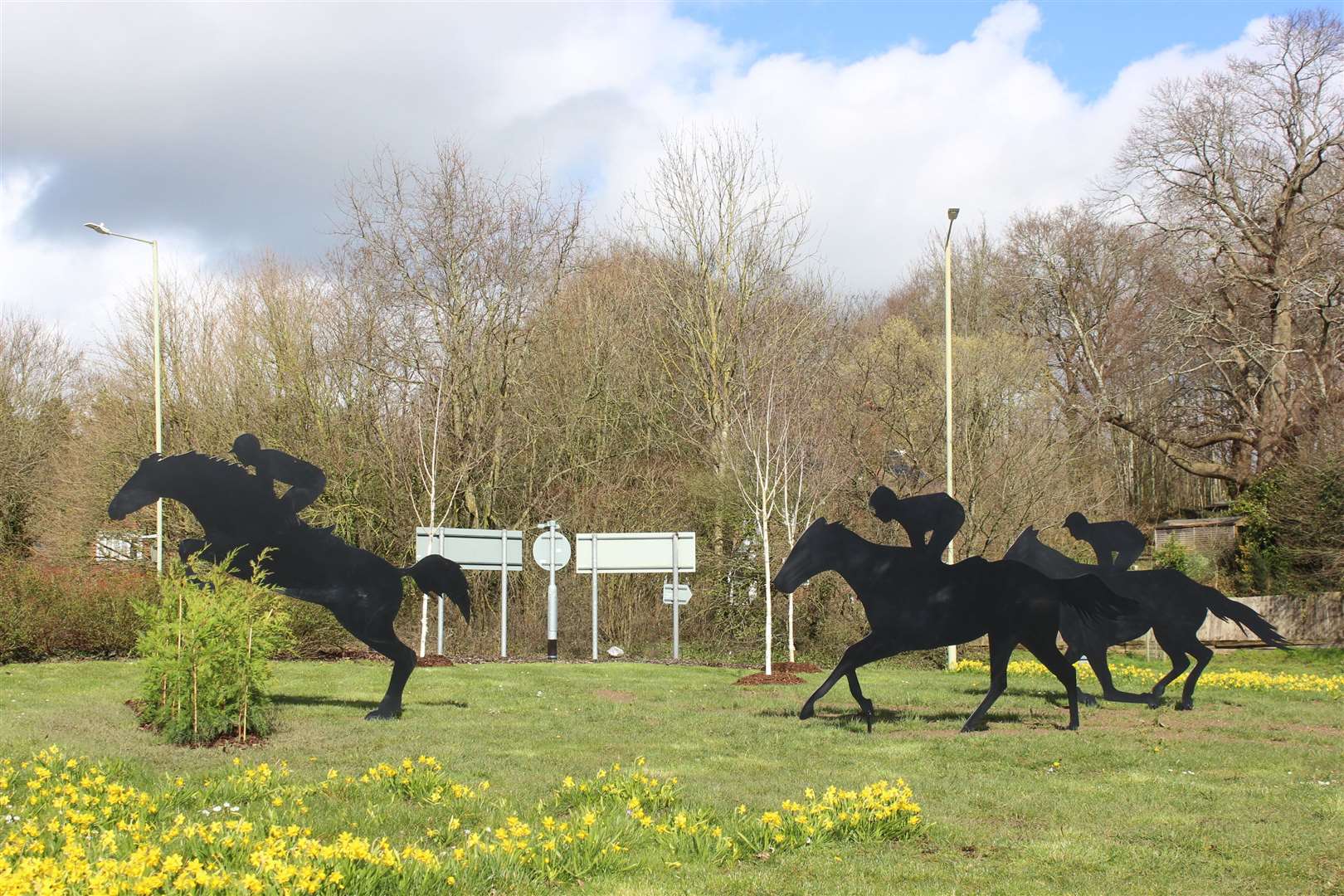 A roundabout on the A20 had horses and shrub 'brush fences' placed on it earlier this year