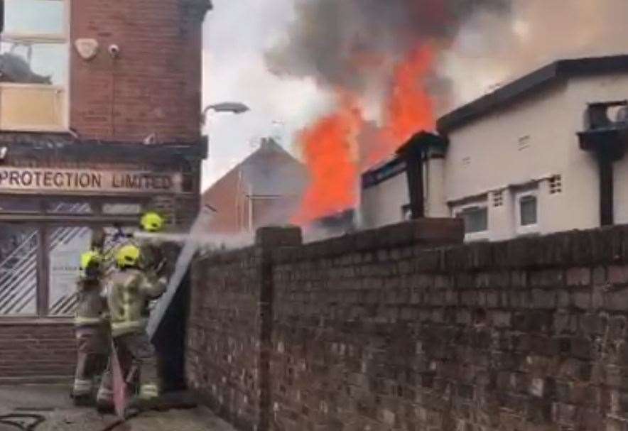 Firefighters battling the blaze. Picture: Geoff Montague-Smith