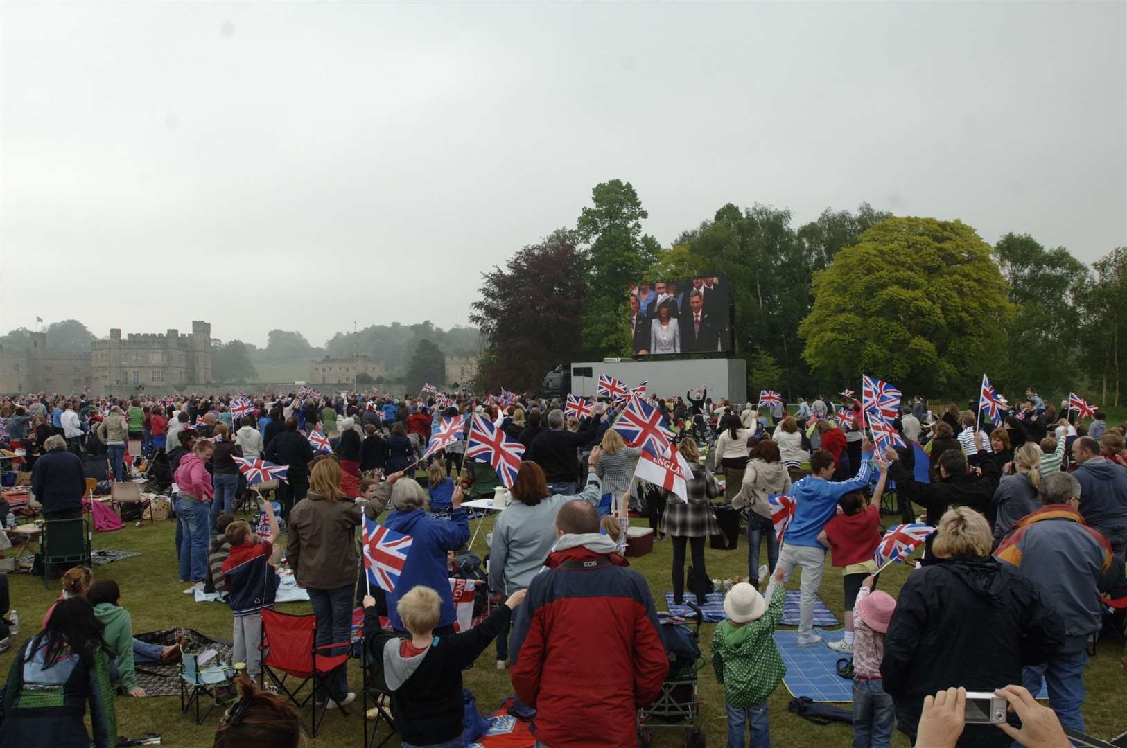 Visitors watched the wedding on the large screen at Leeds Castle. Picture: John Wardley