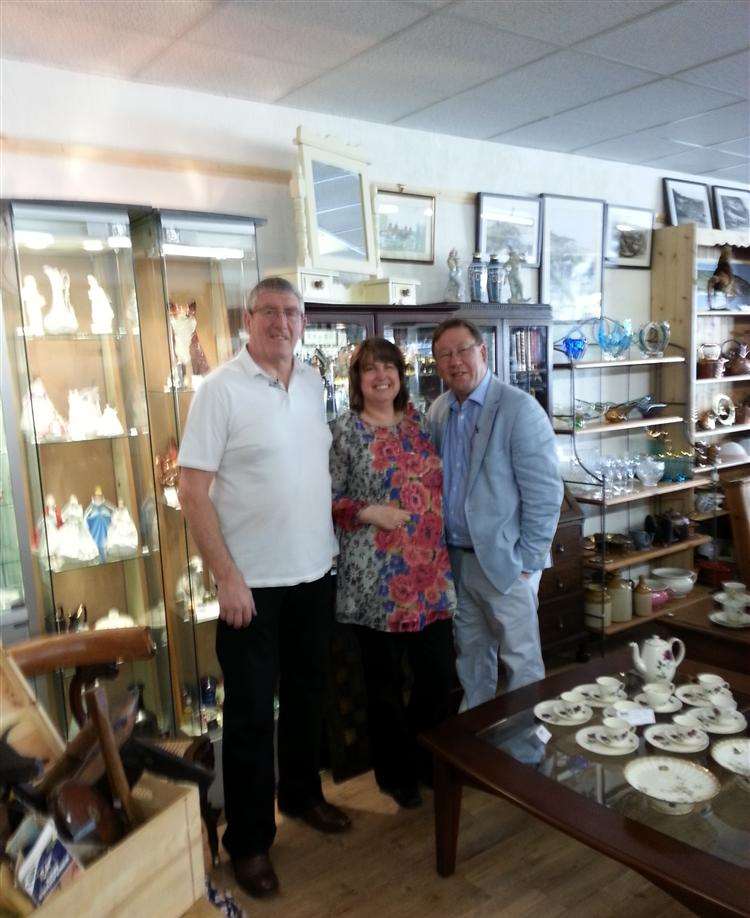 Dealer Mark Stacey with Carol and Mick Davies from Deal