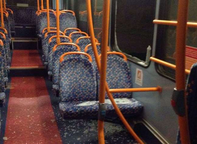 The bus after a brick had been thrown through its window. Picture: Tara Hodgkins