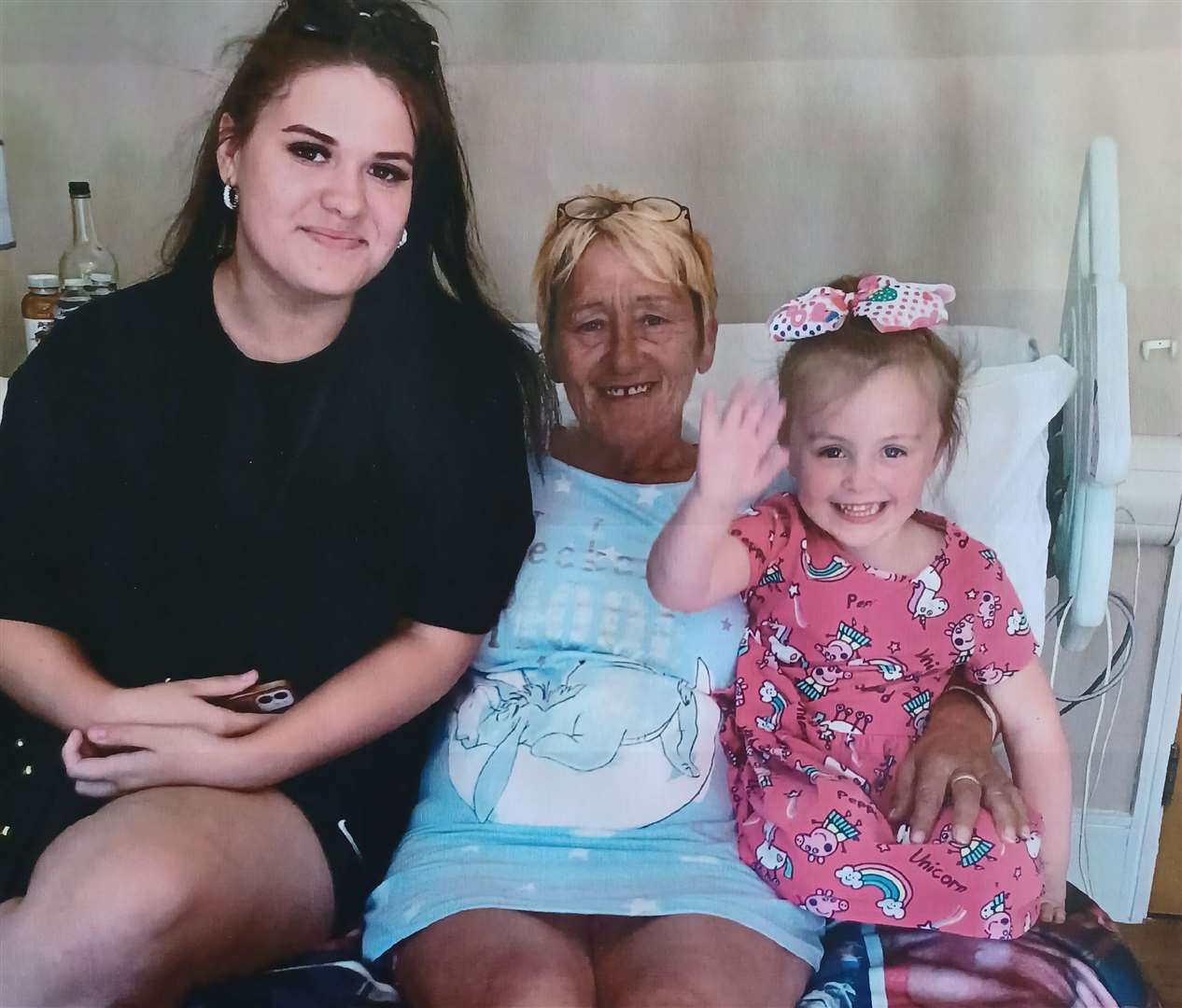 Shirley regularly makes trips to the hospice, and calls them when she has panic attacks. Seen here with her grandaughters Frankie, 15 and Summer, 4. Picture: Debbie Annett