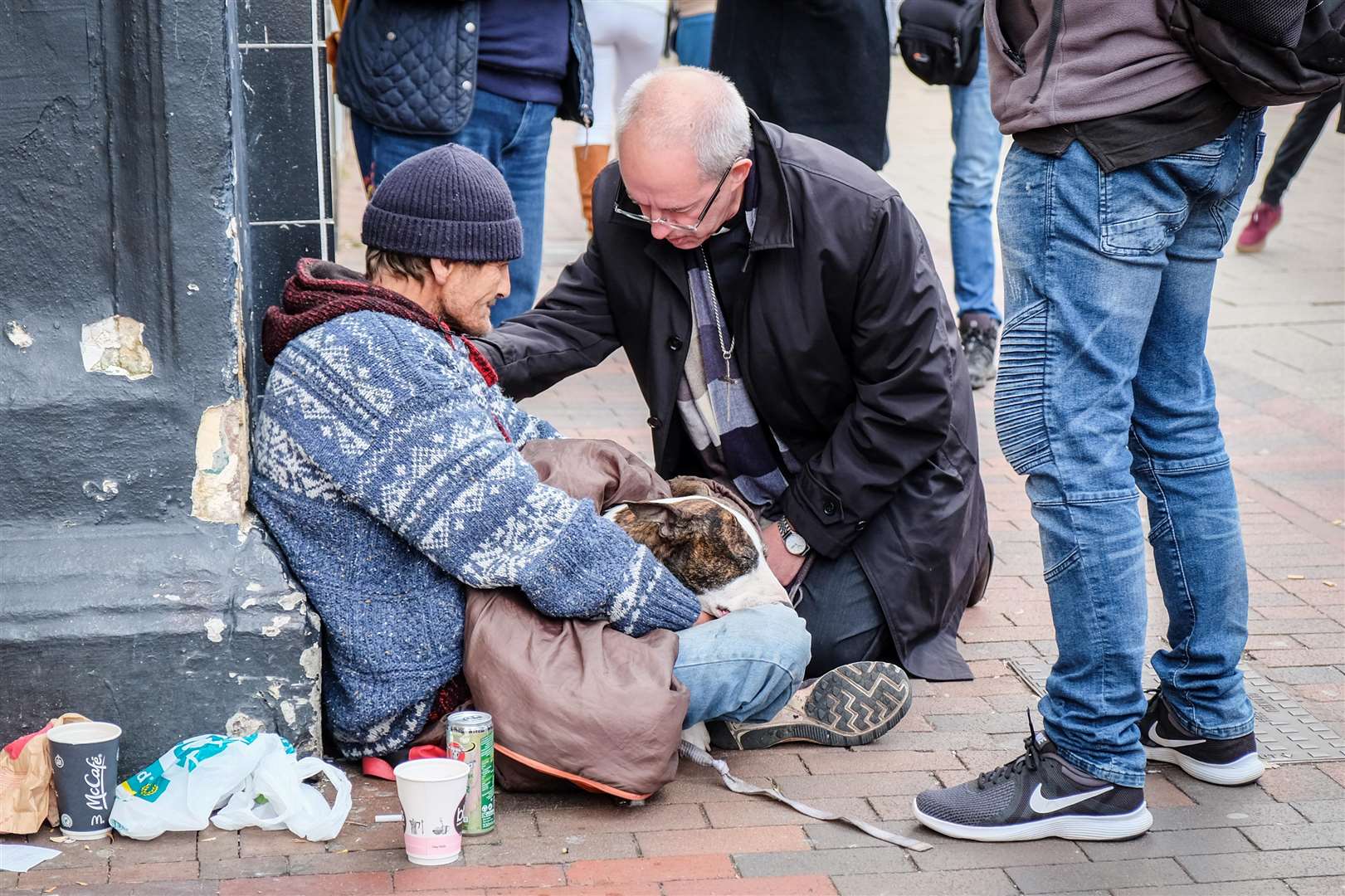 Archbishop Justin Welby talks to a homeless man in Chatham High Street. Picture: Matthew Walker