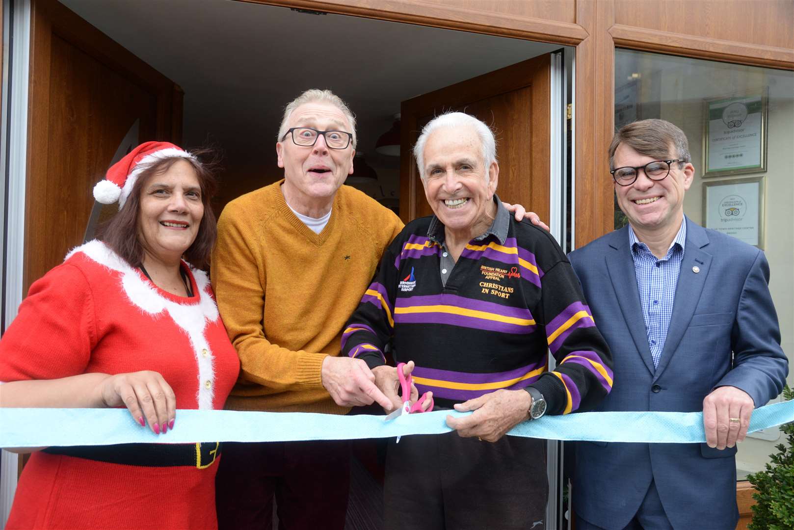 Owner Jenny Hurkett, retiring comic Paul Harris, former Crackerjack comic Don Maclean and show director Dean Caston celebrate the opening of new doors at the Criterion Theatre, Blue Town, Sheerness on Tuesday. Picture: Chris Davey. (23910327)