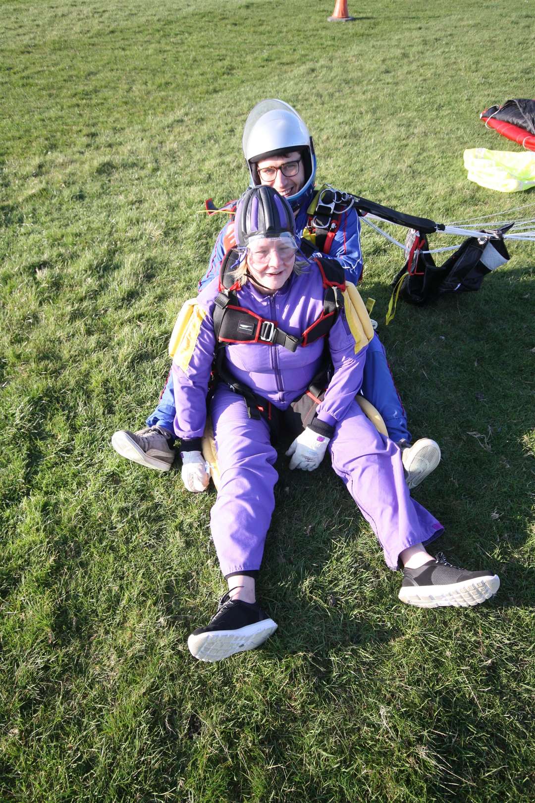 Down safely: Paula Smith from Sheerness East Working Men's Club lands at Headcorn after her charity jump (8174818)