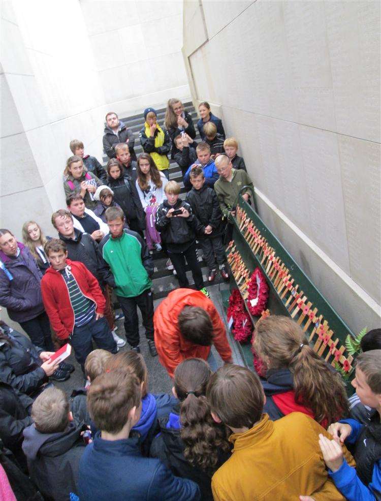 Year 8 students from St George's Church of England Foundation School, Broadstairs, inspect wreaths laid, during their visit to the battlefields of Belgium and Ypres.