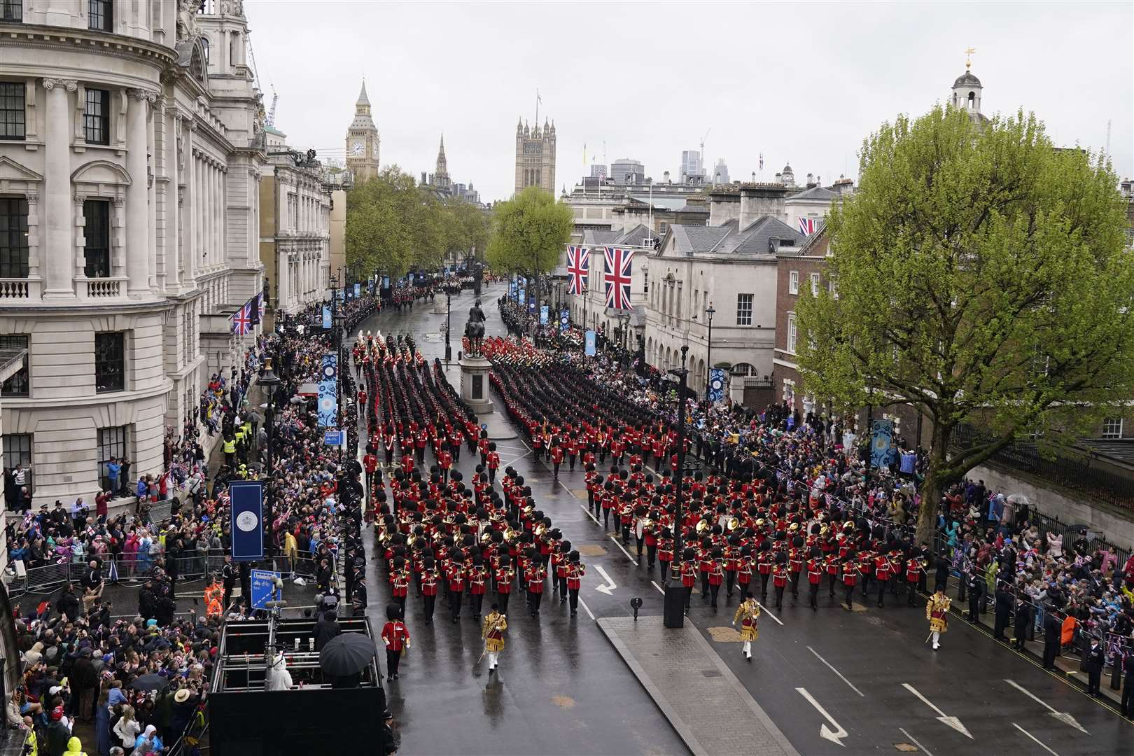 The coronation procession passes along The Mall to Buckingham Palace (Danny Lawson/PA)