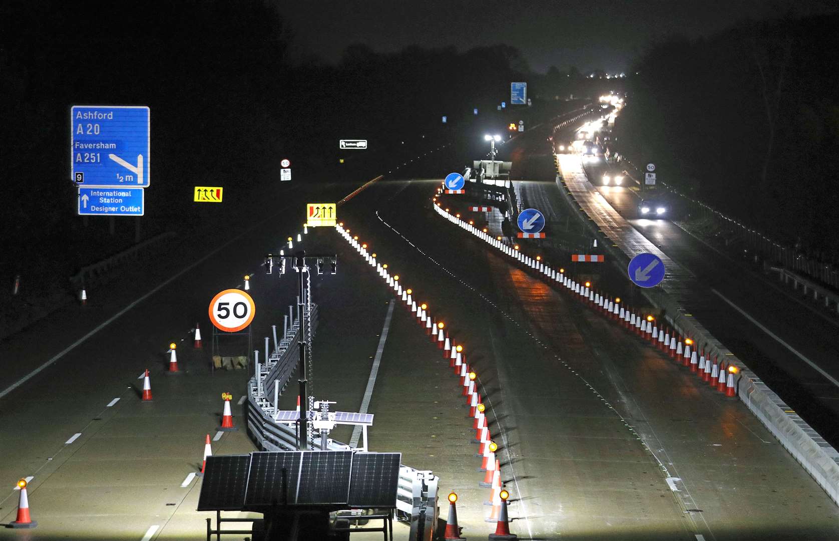 Traffic on the right-hand lane makes its way westbound along the M20 near to Ashford in Kent as barriers are put in place for Operation Brock – contingency measures which involve using a moveable lane divider to keep traffic moving on the motorway whenever there is disruption at the Channel (Andrew Matthews/PA)