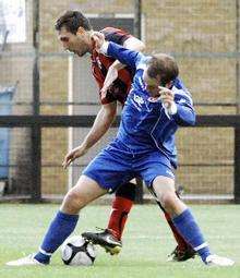 Garry Richards battles with Lee Clarke at Park View Road