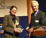 Monica Harper receives the award on behalf of Fidelity presented by Sir Sandy Bruce-Lockhart