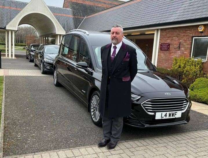 Alex Whitmey of Sittingbourne funeral firm William Whitmey with a hearse at the Garden of England crematorium, Bobbing