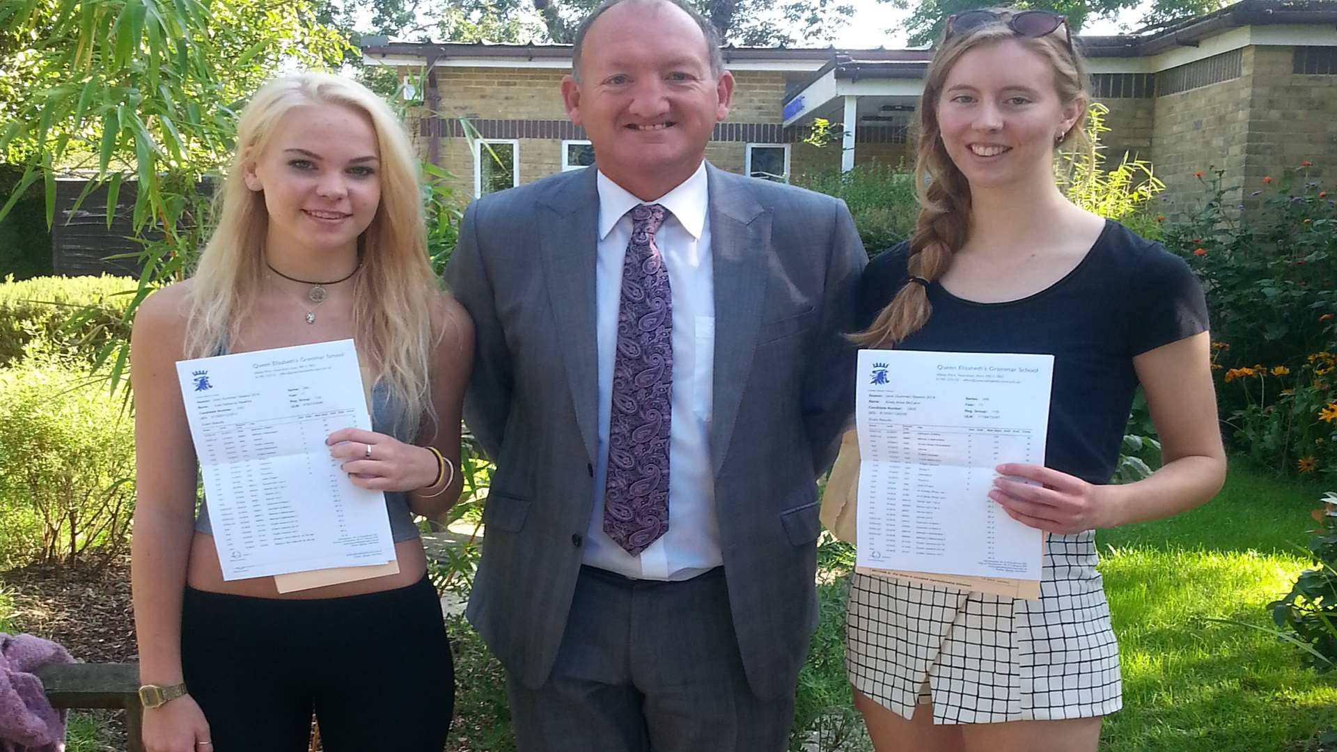 Head teacher David Anderson with pupils Kate Hawkins and Kirsty McCann
