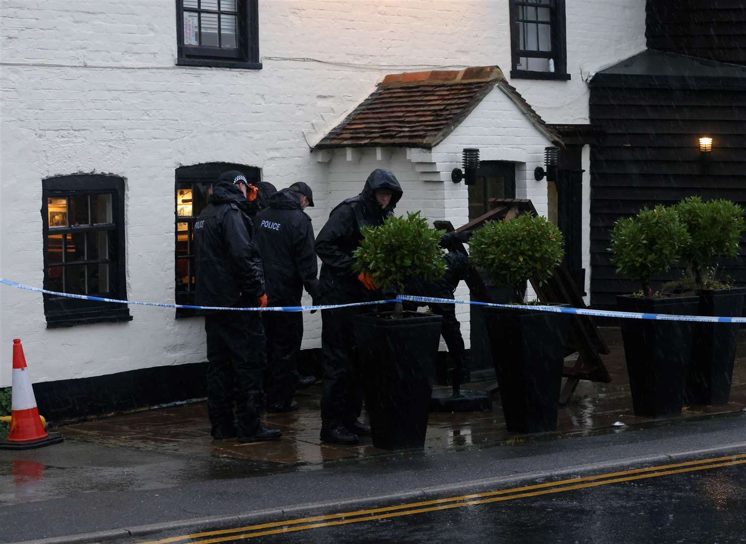 Police at the Cricketers Inn pub in Meopham where Craig Allen was killed in the joint attack. Picture: UKNIP