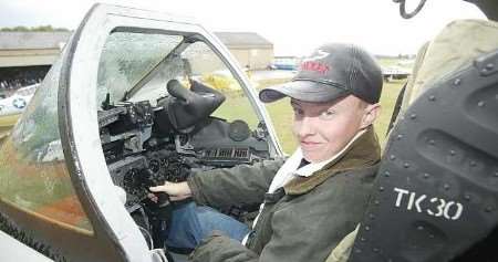 Young Simon Coulter tries the Lightning's cockpit out for size. Picture: PETER STILL