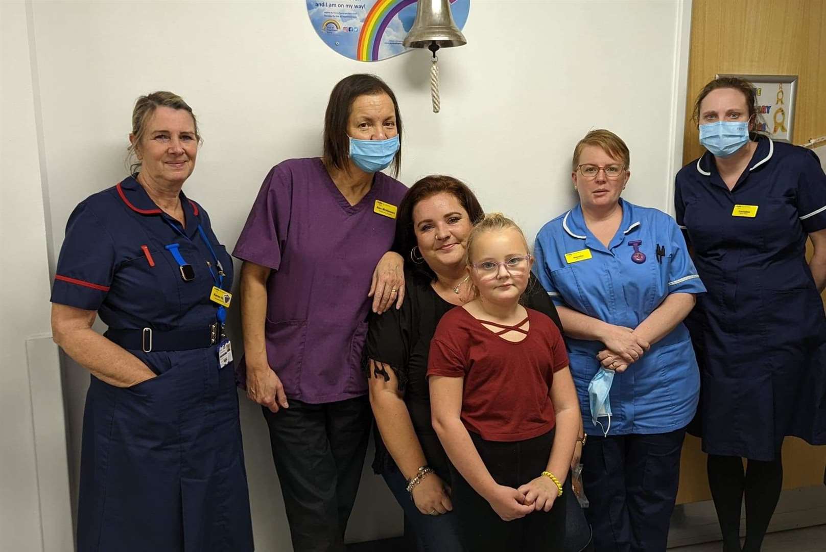 Ruby and her mum Vikki with members of staff at Medway Maritime Hospital