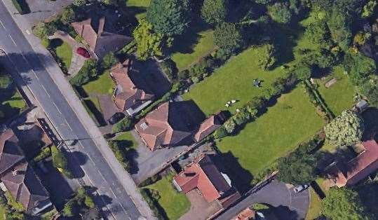 An aerial view of the homes shows they all have generous gardens