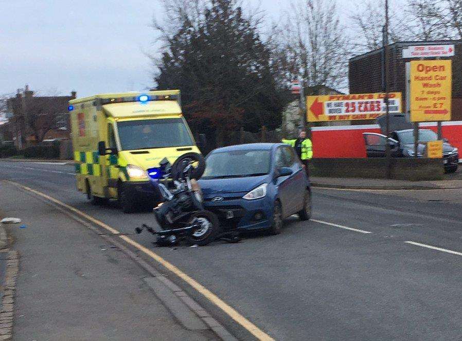 Police and ambulance crews were called after a motorcycle and a car crashed. Picture: @AshAnother