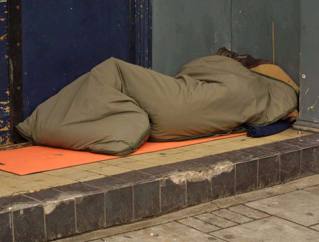 People sleeping rough often have to resort to begging. Stock image