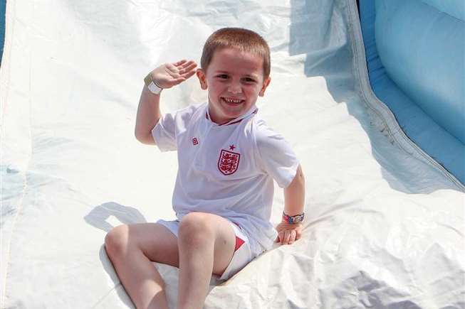 Bradley Hyde, five, enjoying the slide at The Dannyboy Trust fun day
