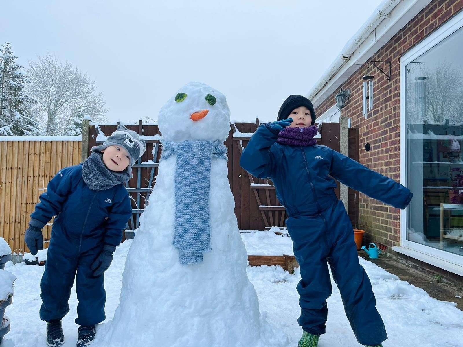 Kyle and Leo enjoy the snow in Gillingham