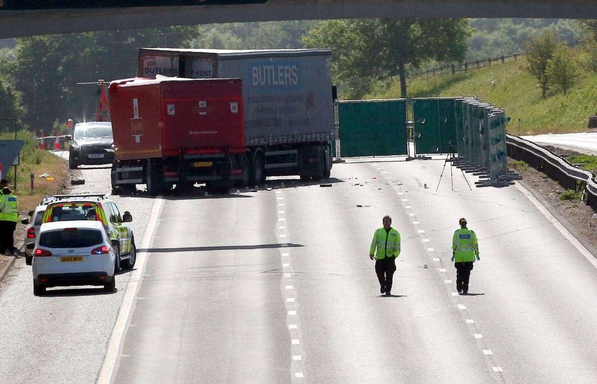 Crash investigators on the A2 near Dartford where two lorries collided. Picture: UKNIP