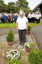 Brenda Hardman laying a wreath on behalf of Leysdown Parish Council