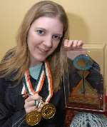 Christie Waddington with her medals. Picture: BARRY DUFFIELD