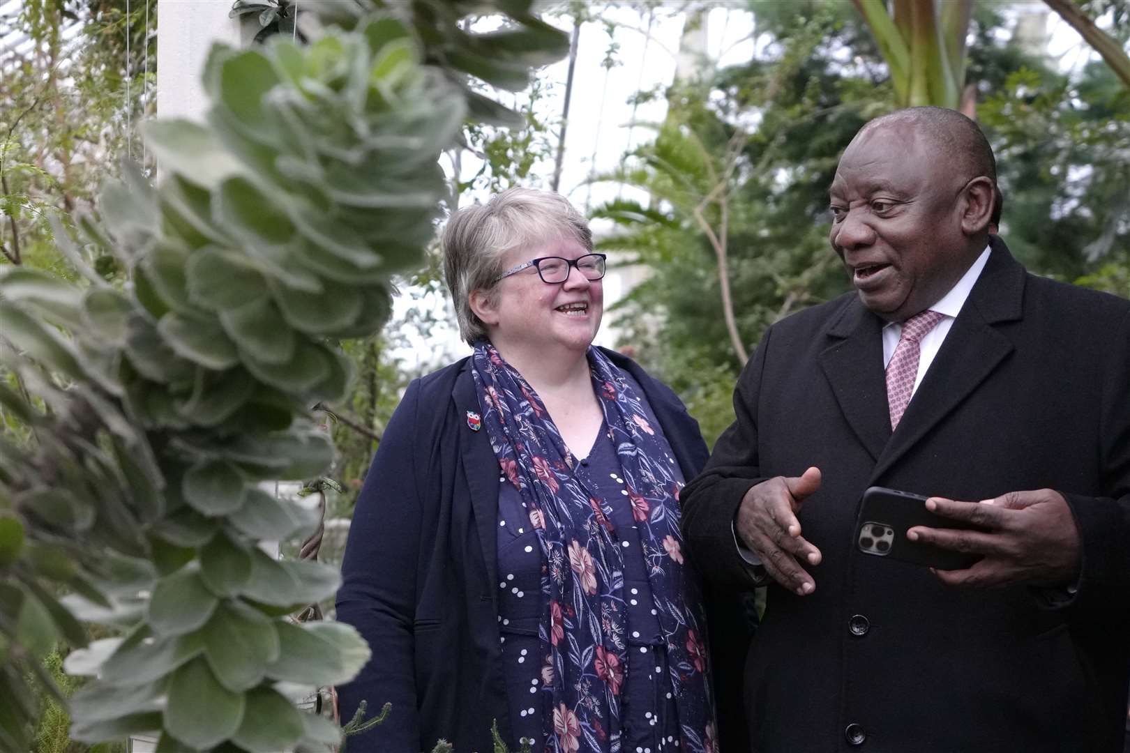 The president with Environment Secretary Therese Coffey at Kew (Kirsty Wigglesworth/PA)