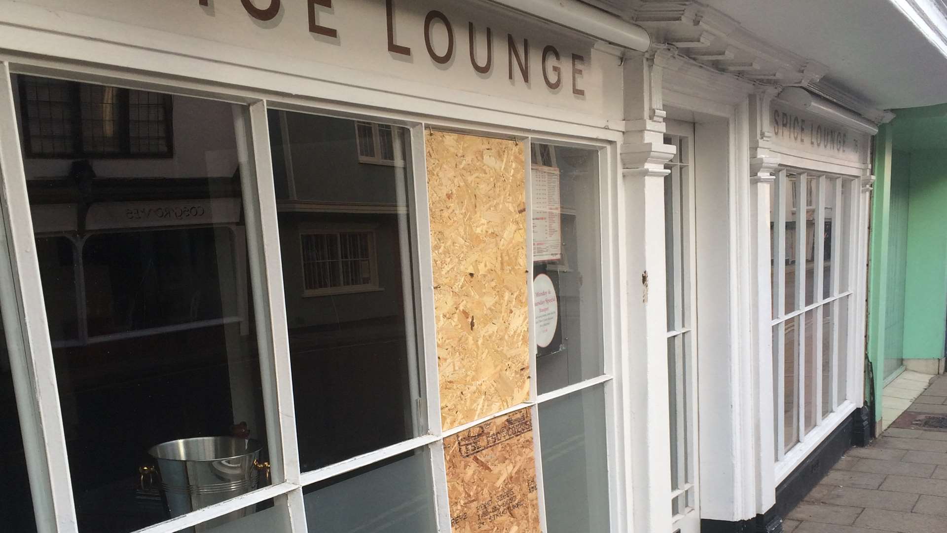 A window of the Spice Lounge was smashed.