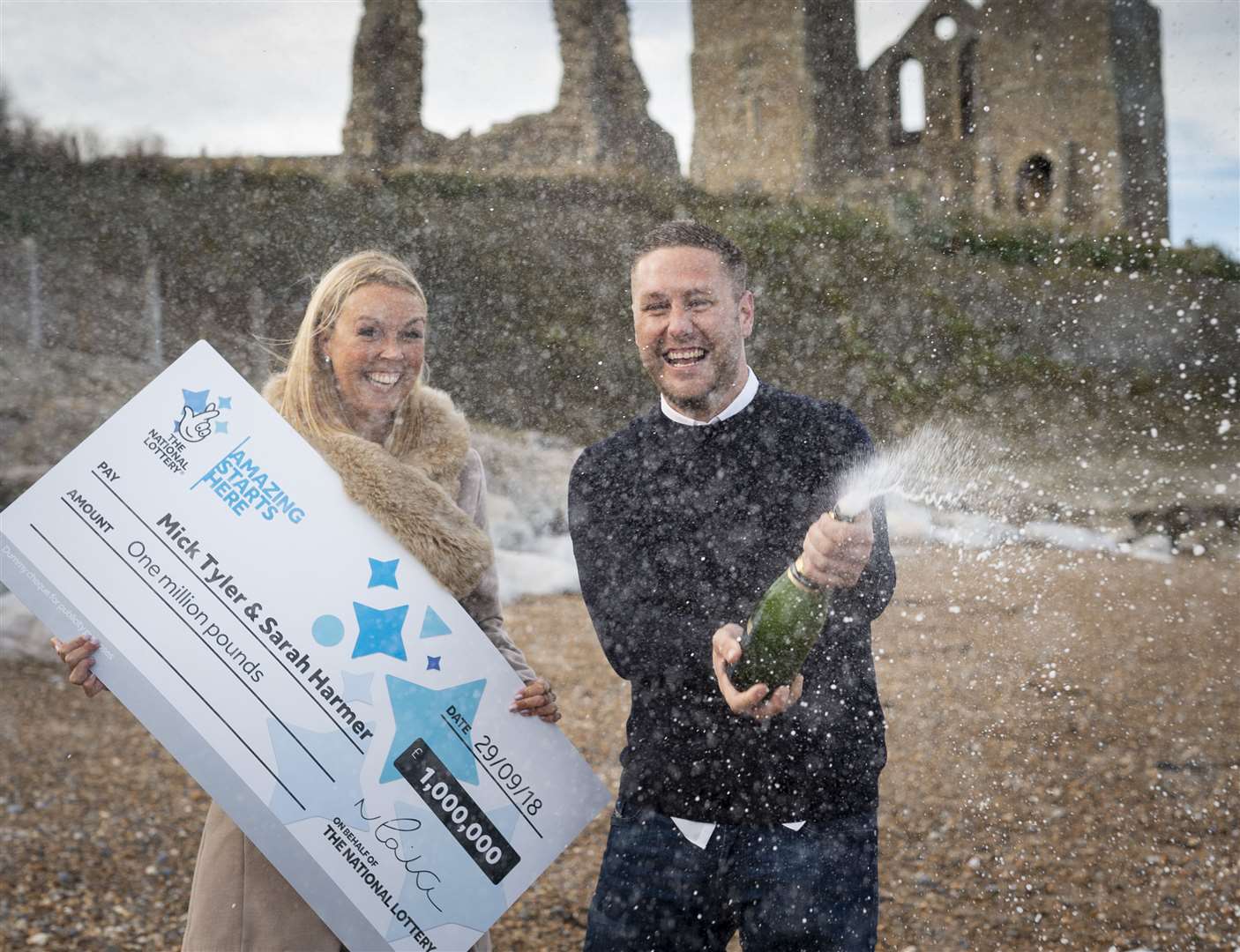 Mick Tyler and Sarah Harmer celebrate their £1m win