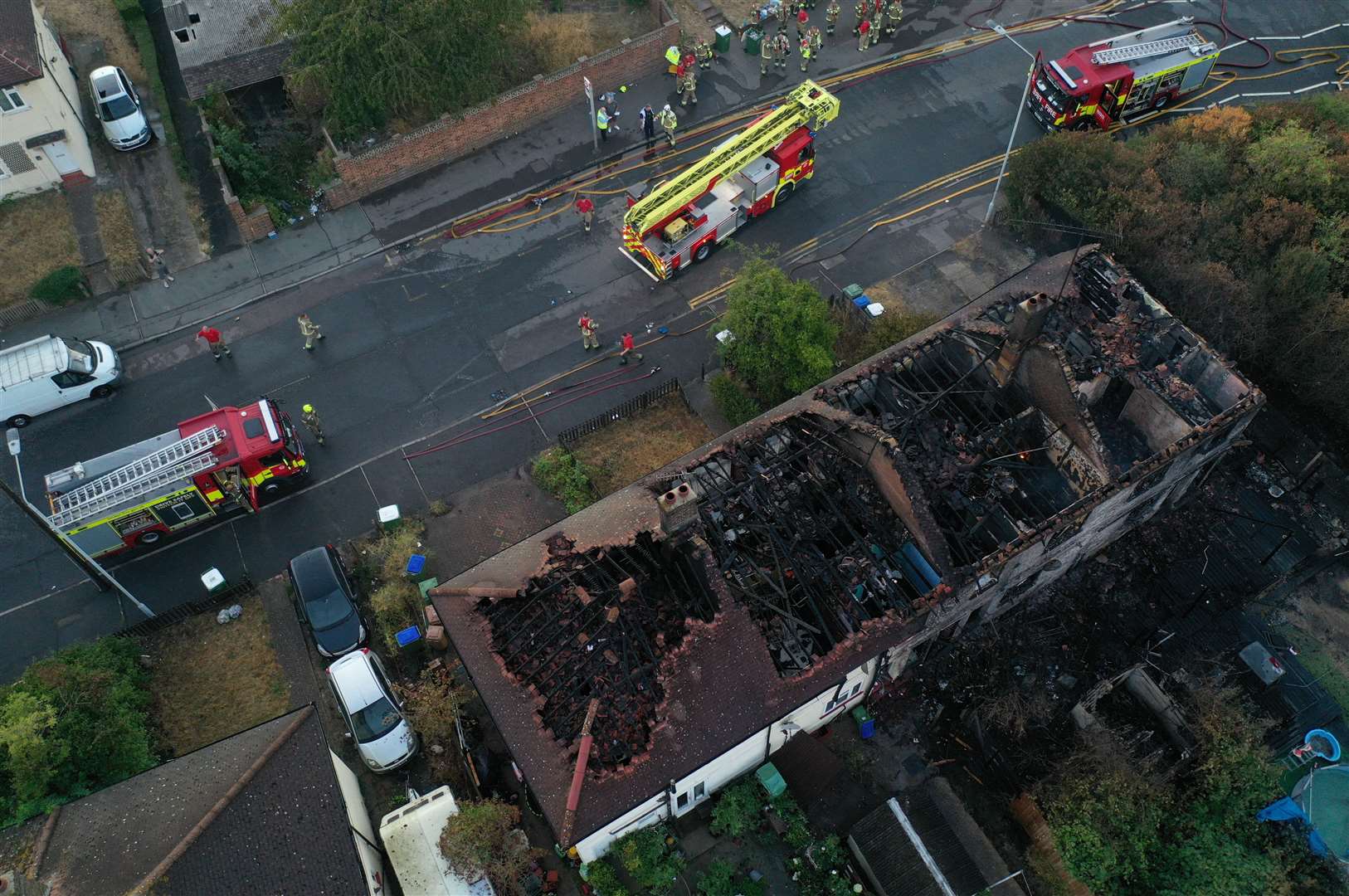 Dramatic aerial pictures show the scale of a huge fire which swept through four homes in Crayford Way, Crayford, near Dartford. Photo: UKNIP