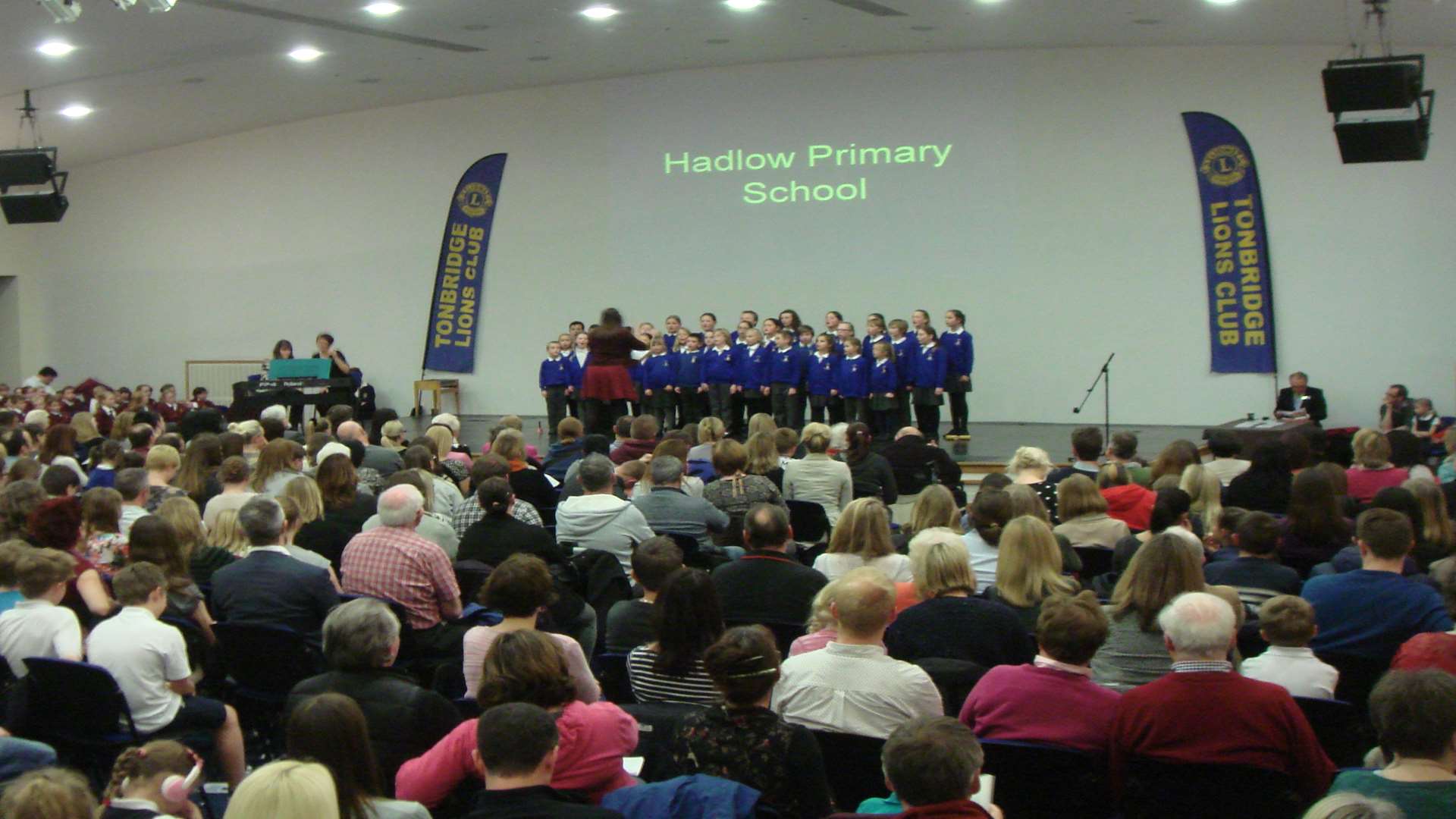 Hadlow School Choir perform in front of a packed audience.