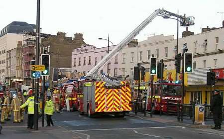 Firefighters tackle the blaze at the amusement arcade. Picture: Mike Pett