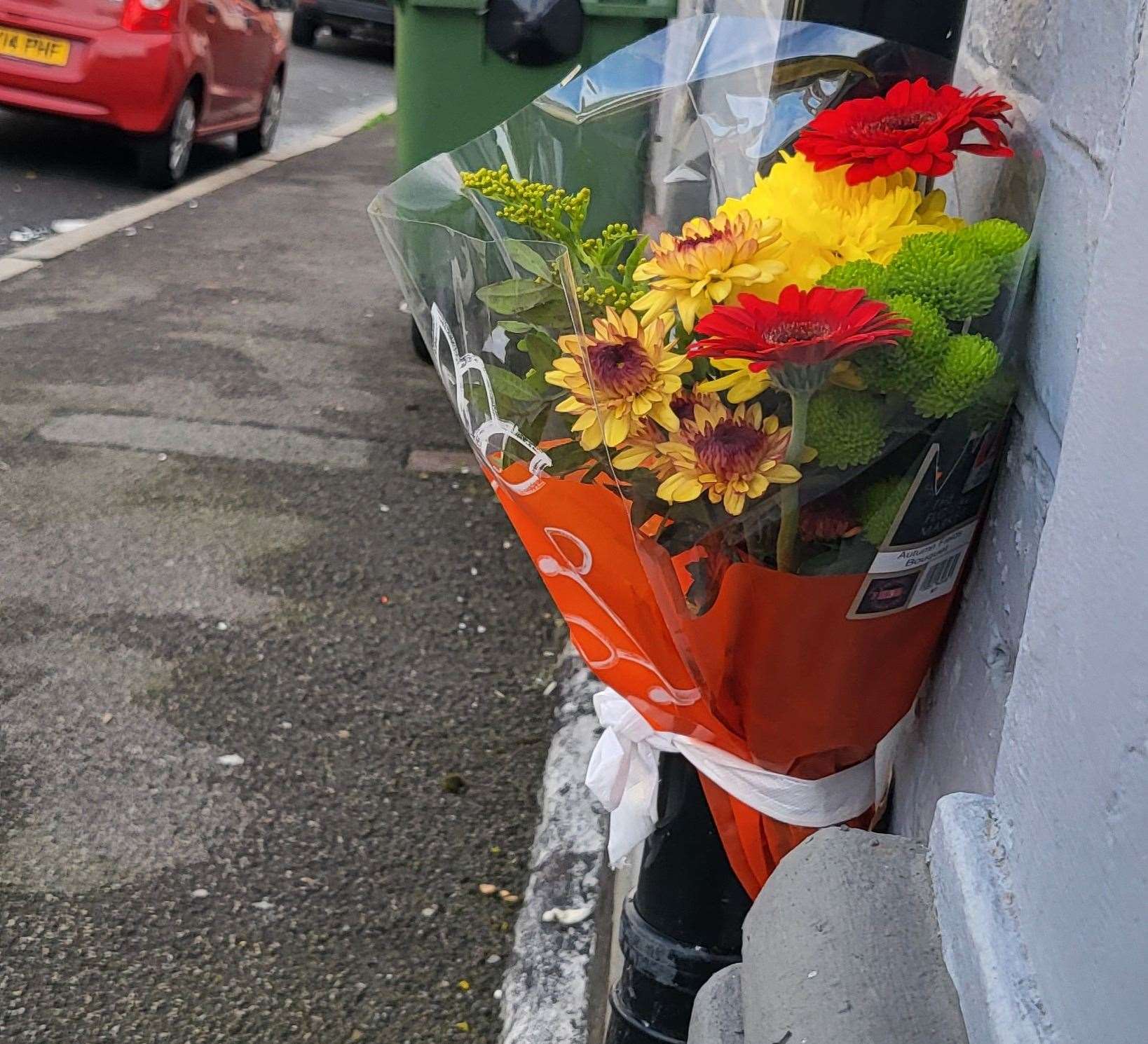 A floral tribute to Anthony Armstrong was placed at the scene in New Street, Folkestone, where he died after the fatal attack. Inset, Ruben Smith who was jailed for a year