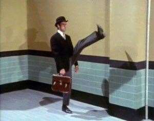 John Cleese in Monty Python's Ministry of Silly Walks sketch