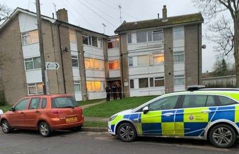 Officers were spotted outside a block of flats in Nettlefield, Kennington last week