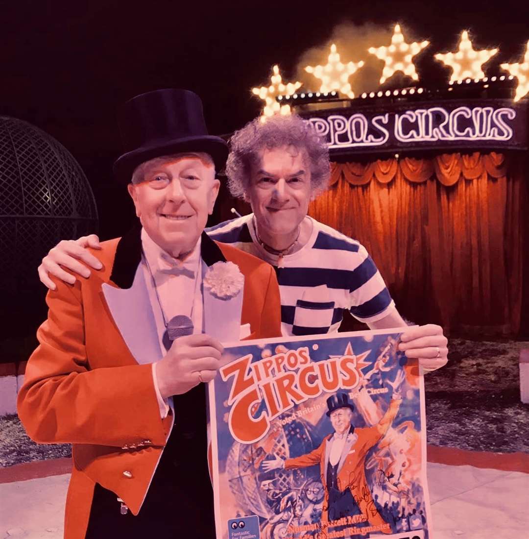Curtis Tappenden with the poster he designed for the circus